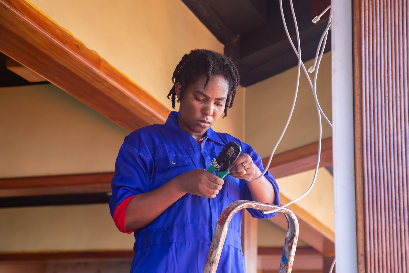 Electrician wiring a home interior